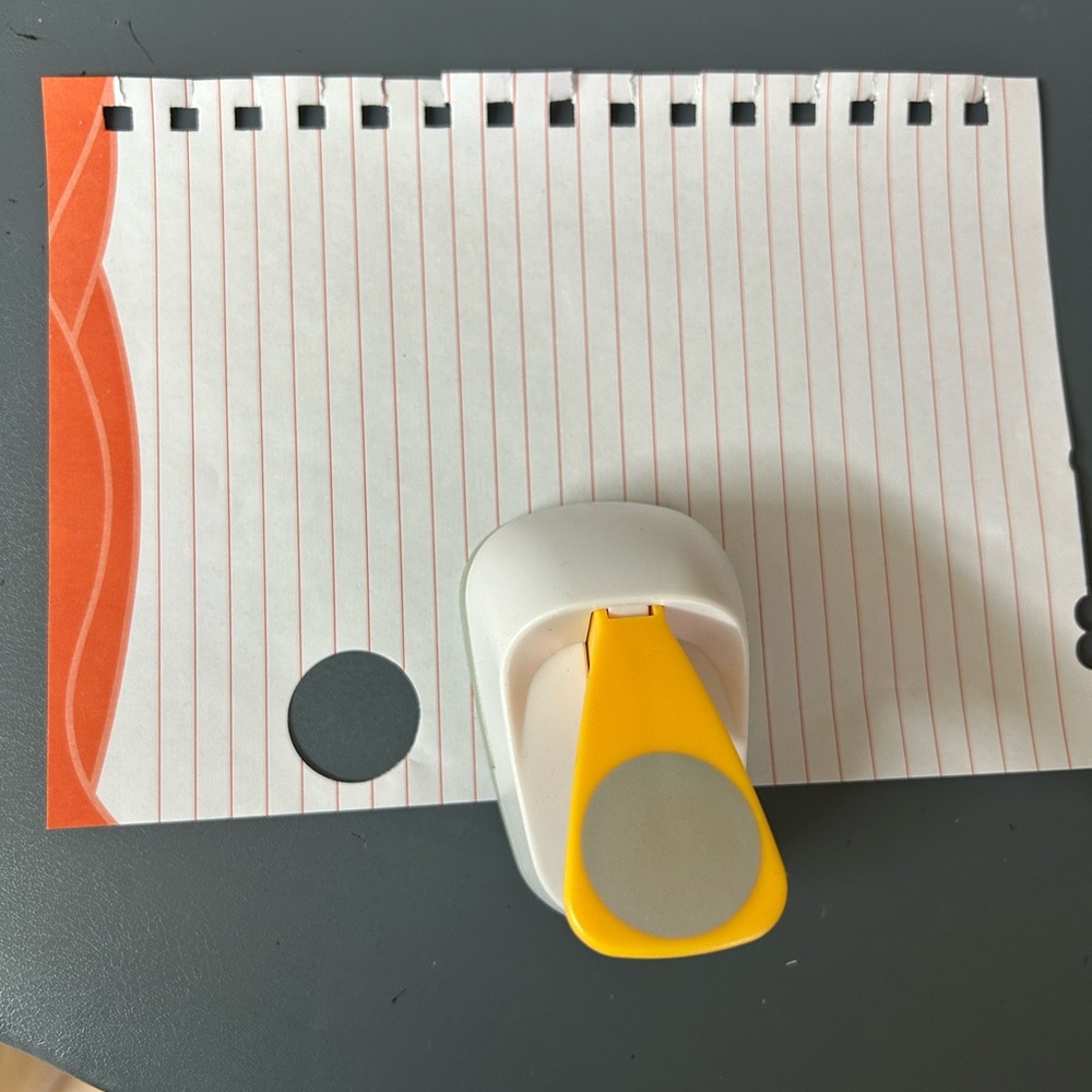 Yellow and Gray Paper Punch